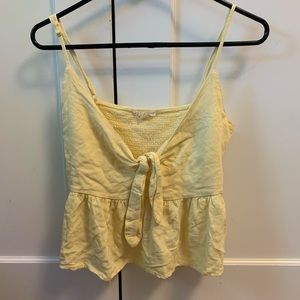bright yellow tank top